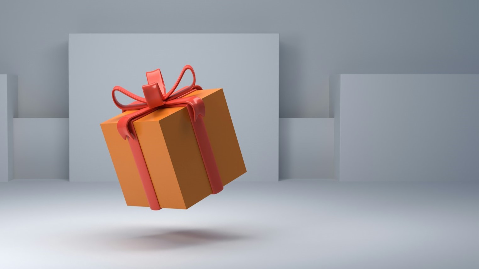Gestileerd ingepakt cadeau met rode strik, passend als modern cadeau tienerjongen